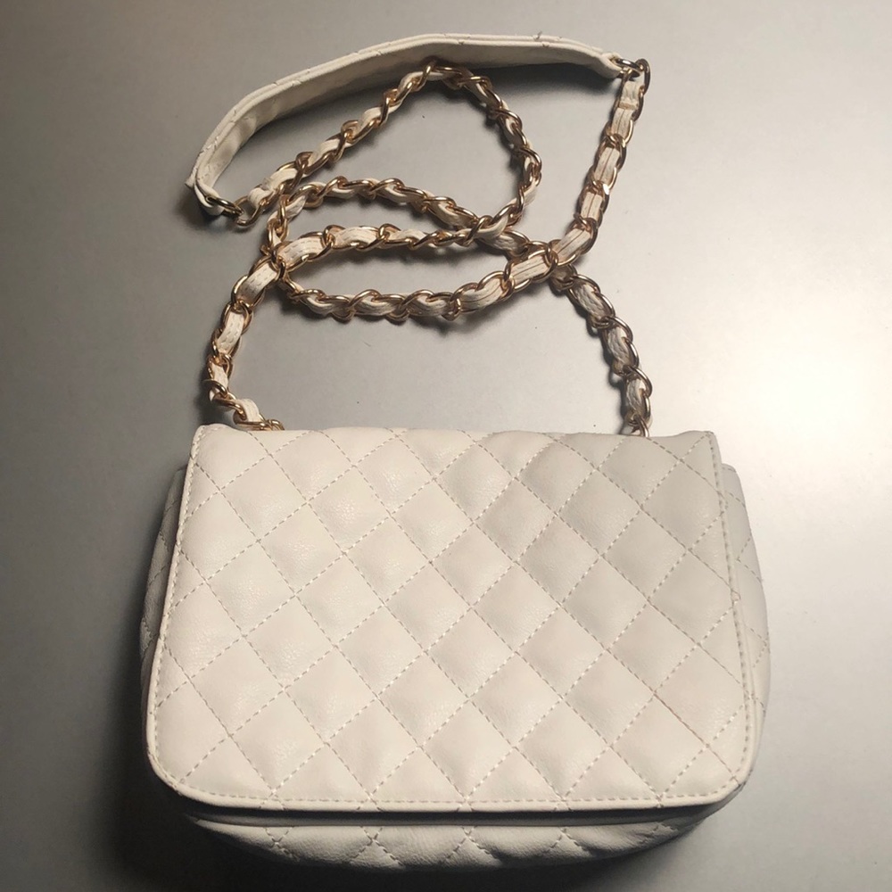 White leather purse with gold chain strap